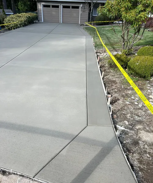 Broom Finish Driveway With Decorative Borders in Edmonds 